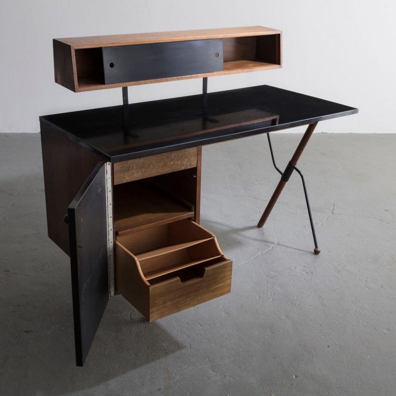 Desk in walnut and wrought iron with pencil box and black laminate surfaces.