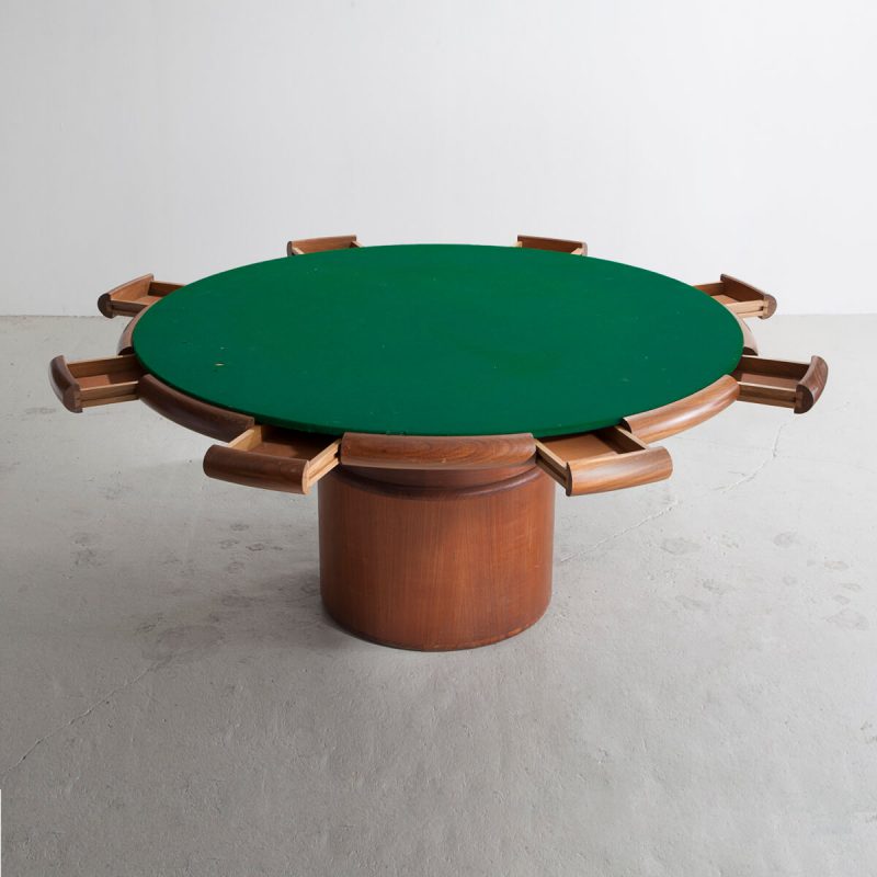 Milhazes Game Table with a cylindrical base, green felt surface and eight drawers around edge.