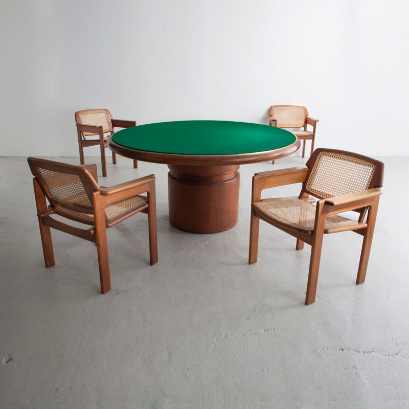 Milhazes Game Table with a cylindrical base, green felt surface and eight drawers around edge.