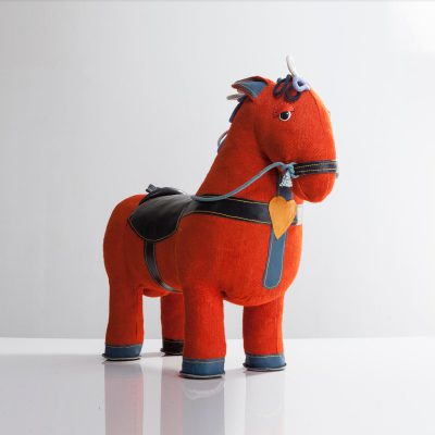 “Therapeutic Toy” Magic Horse in orange jute with black leather detailing.