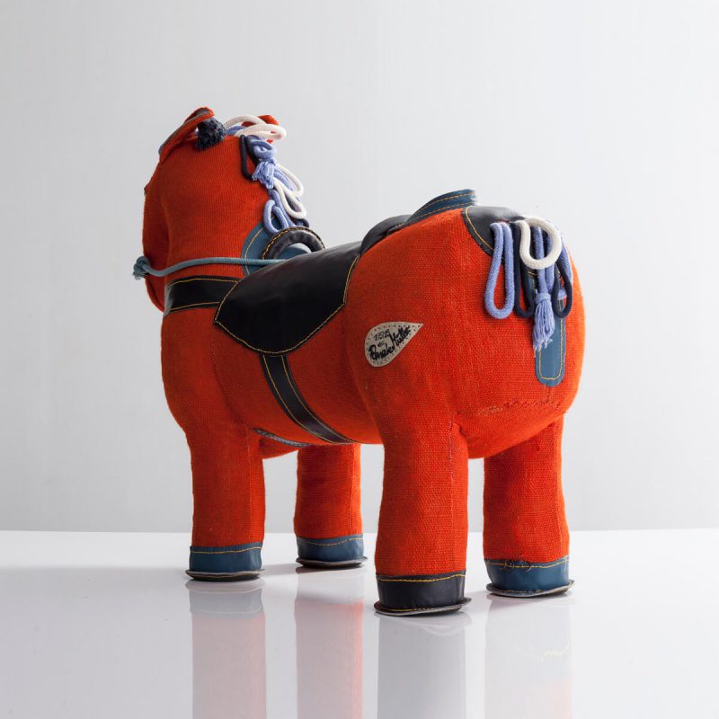 “Therapeutic Toy” Magic Horse in orange jute with black leather detailing.