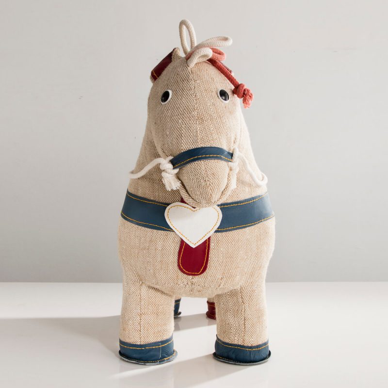 Therapeutic Toy Pony in natural jute with red leather saddle detailing.