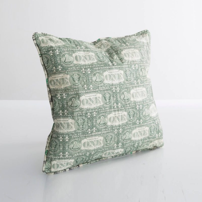 Pillow in cut, pieced, and stitched one-dollar bills.