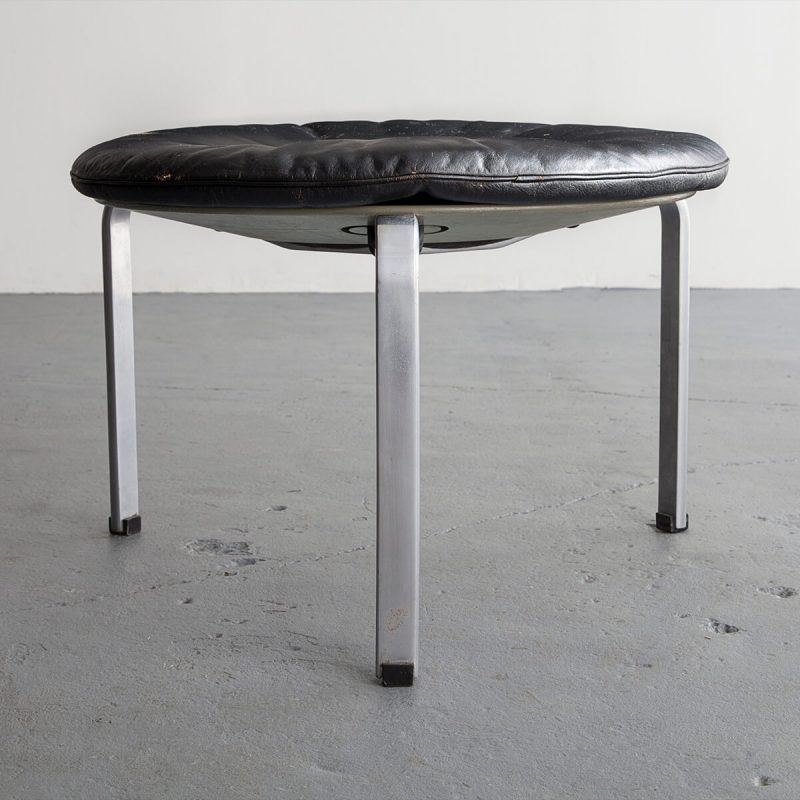 Oversize PK 33 stool with leather seat and steel frame.