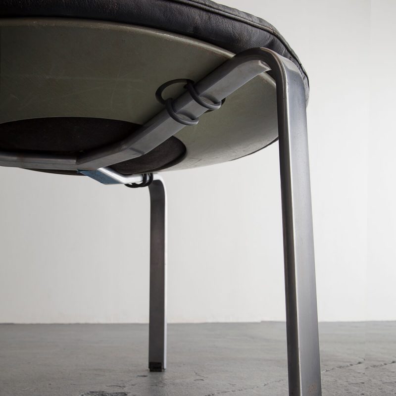 Oversize PK 33 stool with leather seat and steel frame.